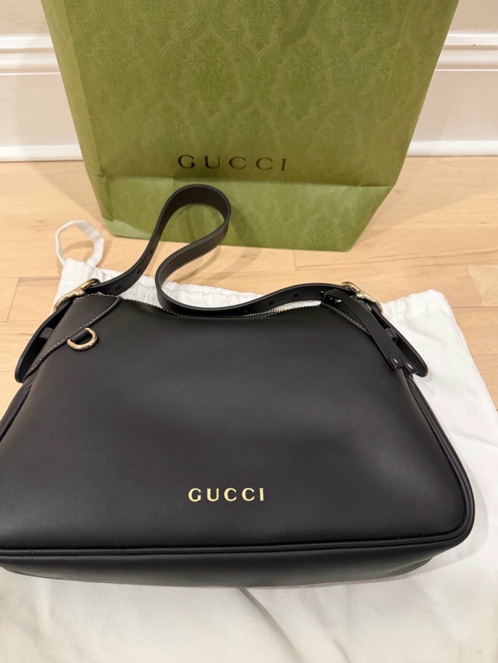 Gucci Black Leather Crossbody Bag with Gold Logo Accent